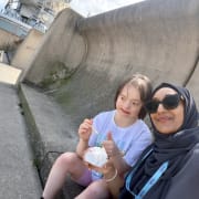 Alima supporting at the beach